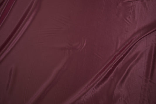 Satin Viskose uni Bordeaux – bordeauxroter, glänzender Kleidungsstoff