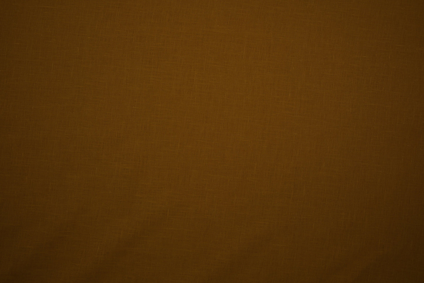 Senffarbener Leinenstoff – feine Struktur in Nahaufnahme