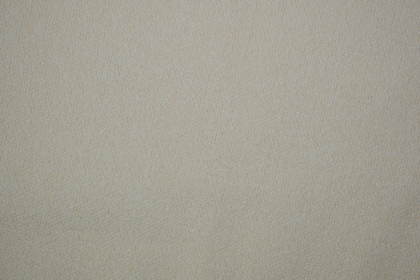 Heller Bouclé Möbelstoff in Creme – strukturierter Polsterstoff für moderne Wohnräume Detailaufnahme der Stoffstruktur