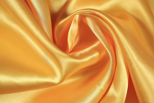 Leuchtender Satinstoff in sonnigem Gelb fĂŒr Sommerprojekte