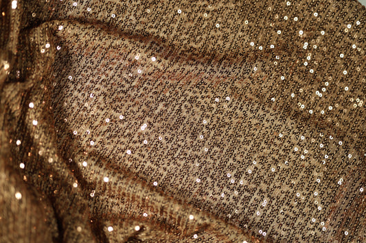 Bronzefarbener Paillettenstoff – schimmernd und ausdrucksstark für extravagante Outfits