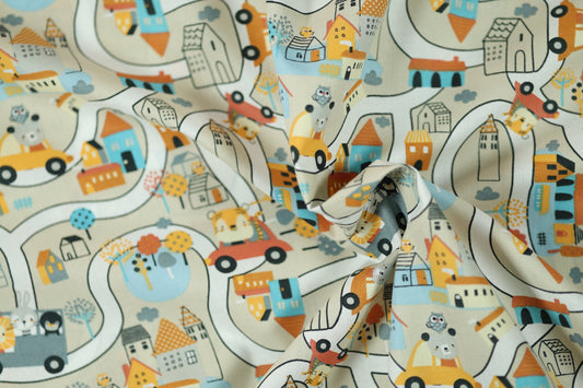 Elastischer Baumwollstoff Tierische Stadtfahrt – Beige mit weichem Griff