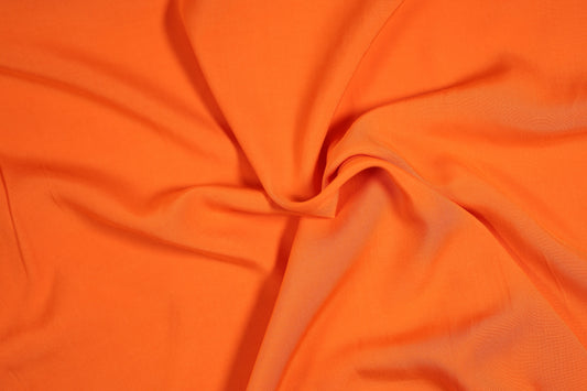 Leichter Viskosestoff in Signalorange – ideal für Kleider und Blusen