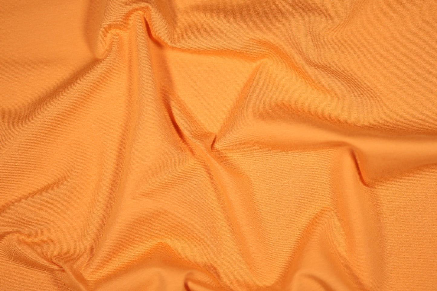 Baumwolljersey in Hellorange – leuchtend, weich & elastisch