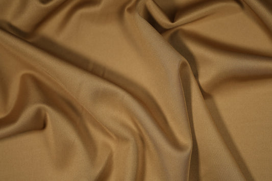Hochwertiger Skuba Jersey Stoff – ideal für enganliegende Kleidung in Goldbraun