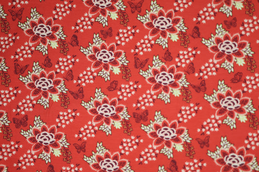 Baumwollstoff mit Motiv: florales muster mit schmetterlingen in rot – weich & kindgerecht.
