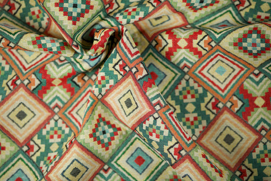 Ethno Möbelstoff mit buntem Quadrat-Design – perfekt für auffällige Polster