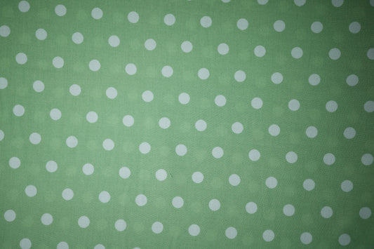 Fließender Stoff mit Punkte in Pastellgrün – perfekt für Blusen oder Röcke