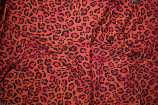 Satin Viskose Stoff mit Leopardenmuster in Neon-Orange und Pink