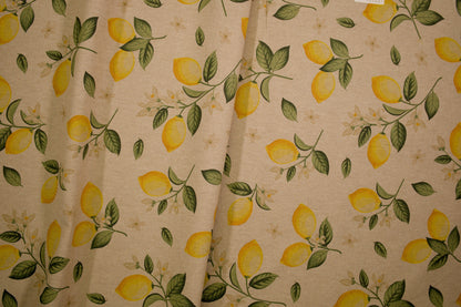 Baumwollmischstoff mit Zitronenmotiv auf naturfarbenem Grund