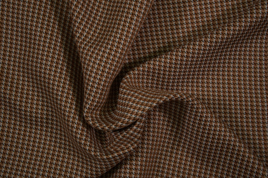 Wollstoff mit feinem braunen Pepita-Muster - Nahaufnahme der Materialqualität 140cm