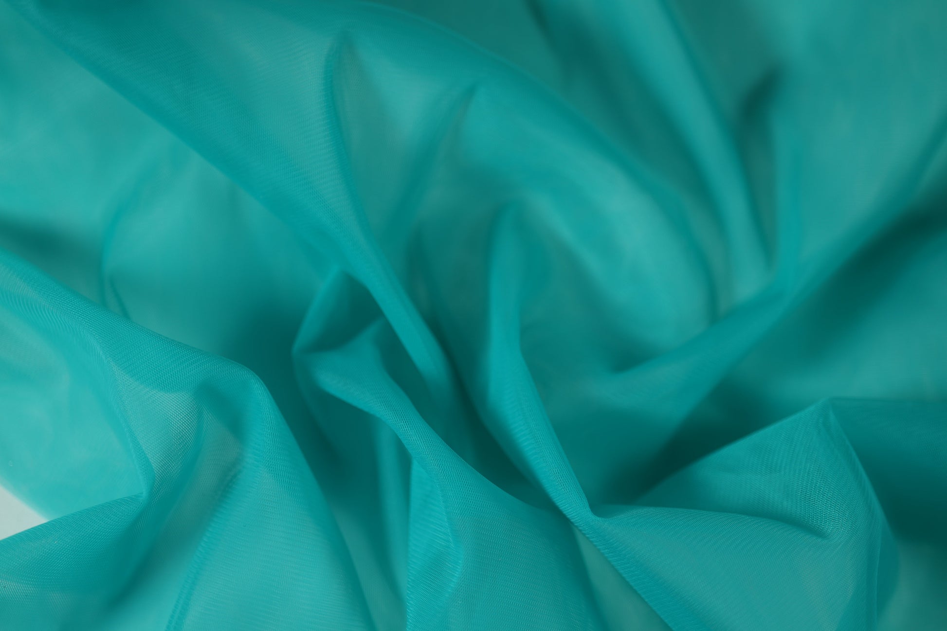 Tüll in Türkis – feines, transparentes Netzgewebe