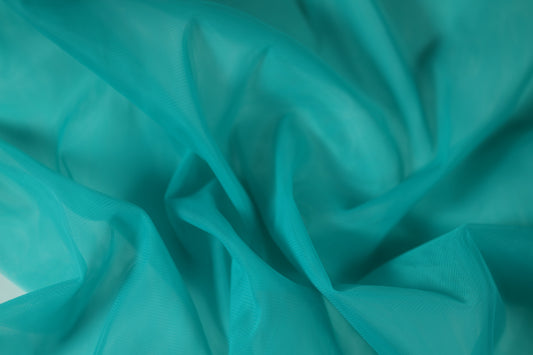 Tüll in Türkis – feines, transparentes Netzgewebe