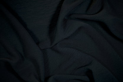 Schwarzer Stoff für Business- und Abendmode
