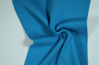 Elastischer Bündchenstoff in intensivem Türkisblau – für auffällige Abschlüsse