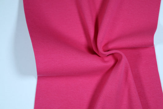 Pinkfarbener Bündchenstoff aus Baumwolle – kräftig und elastisch