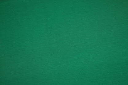 Farbintensiver Baumwolljersey in Grasgrün – perfekt für DIY