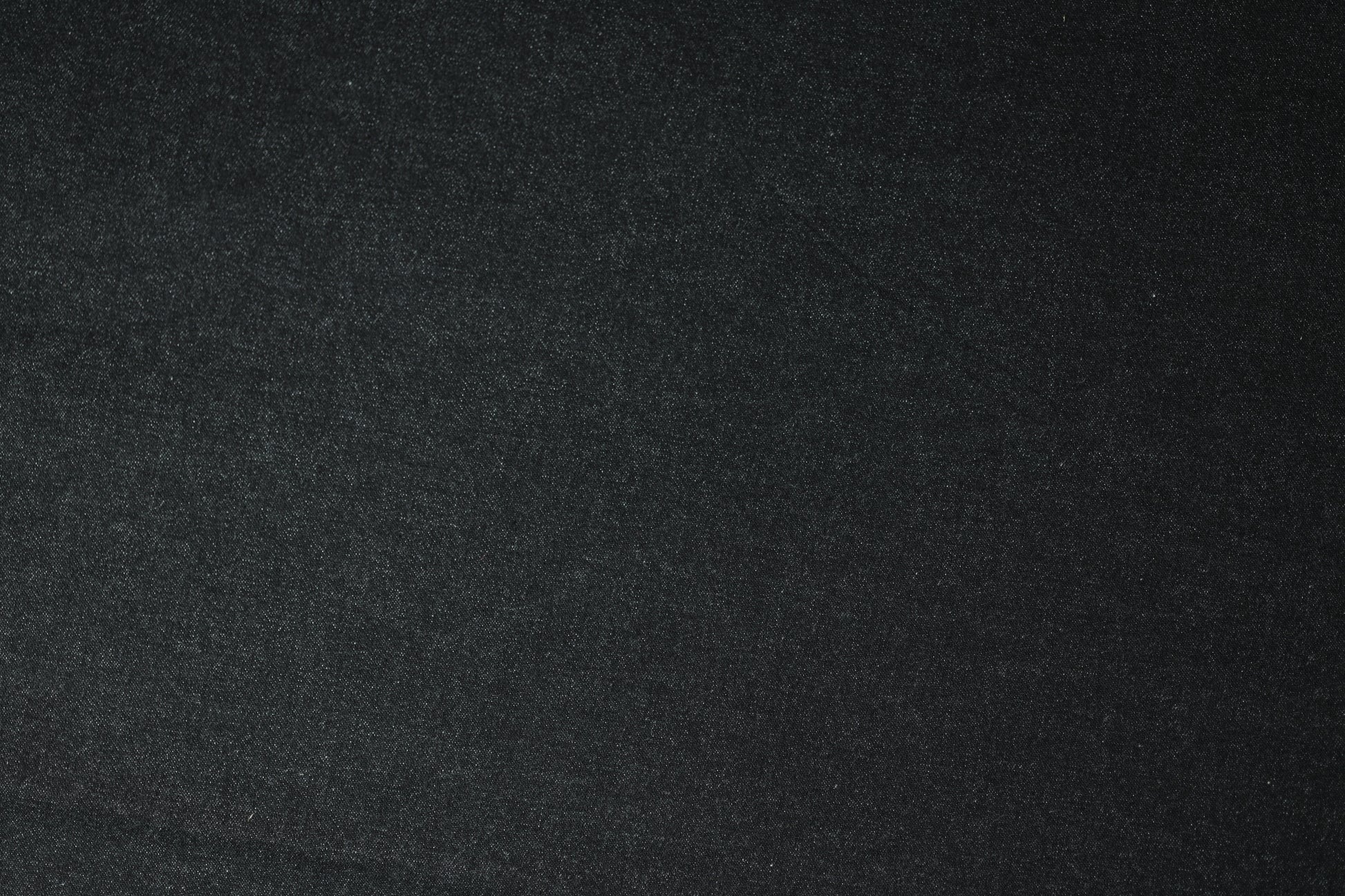 Detailansicht vom Denimstoff Schwarz mit feiner Struktur