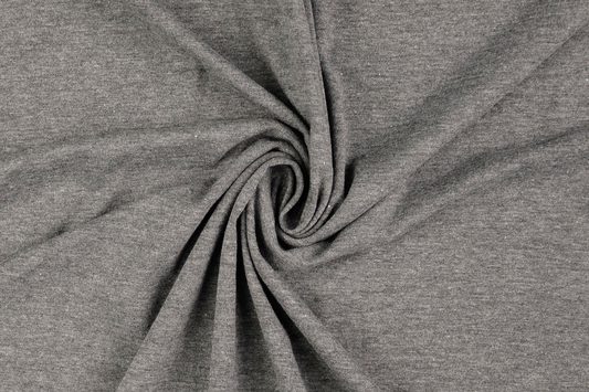 Grau melierter Jersey Stoff gefaltet – weicher elastischer Bekleidungsstoff
